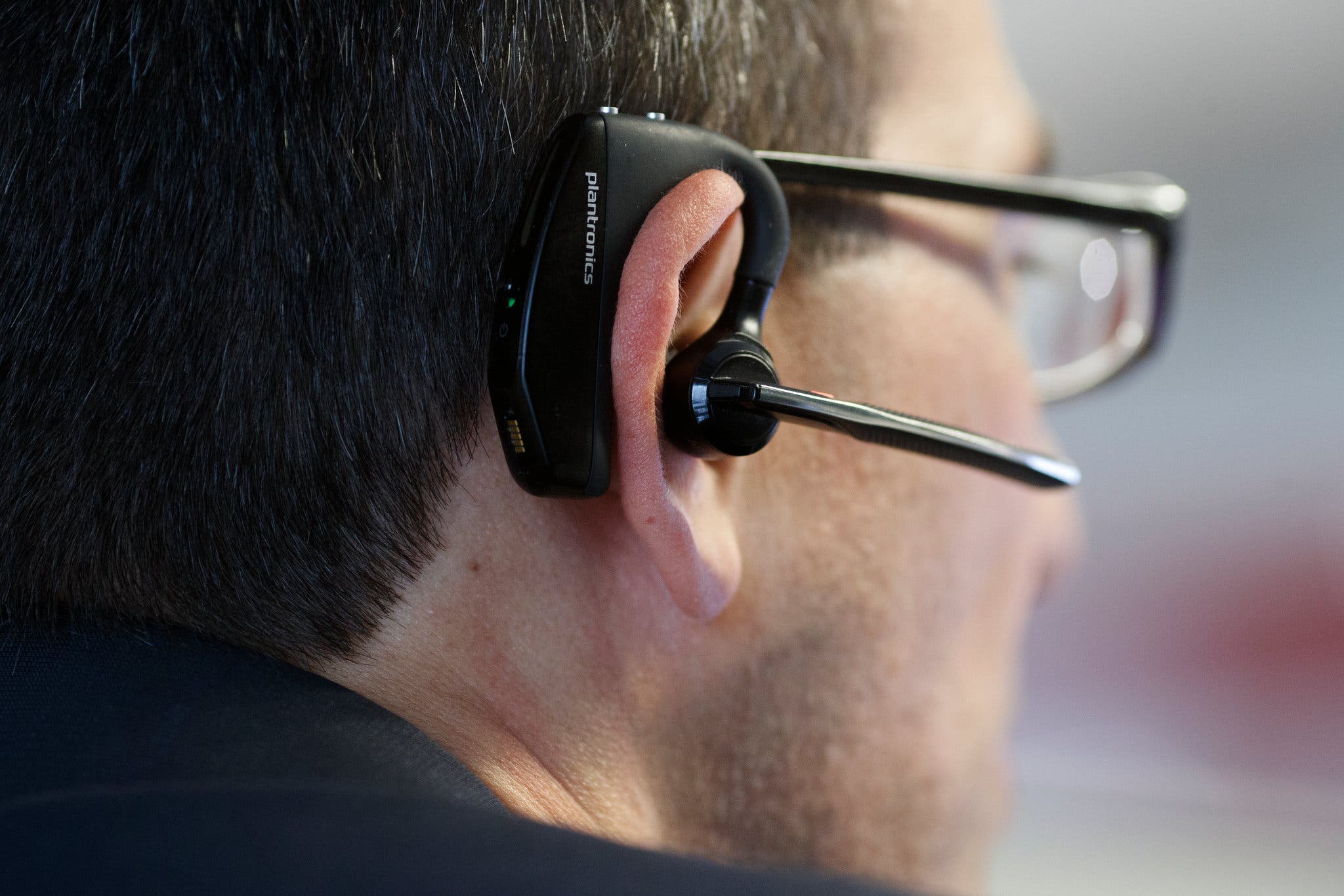 He has two Plantronics Voyager Bluetooth headsets — one is a fully charged backup. CreditTom Brenner/The New York Times