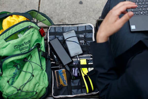 Mr. Lipton’s Anker external cellphone battery can charge his Pixel 2 phone several times.CreditTom Brenner/The New York Times